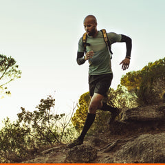 Active adult using Momentous Ashwagandha for alertness and focus