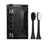 Moon 2-pack replacement toothbrush heads in white and black