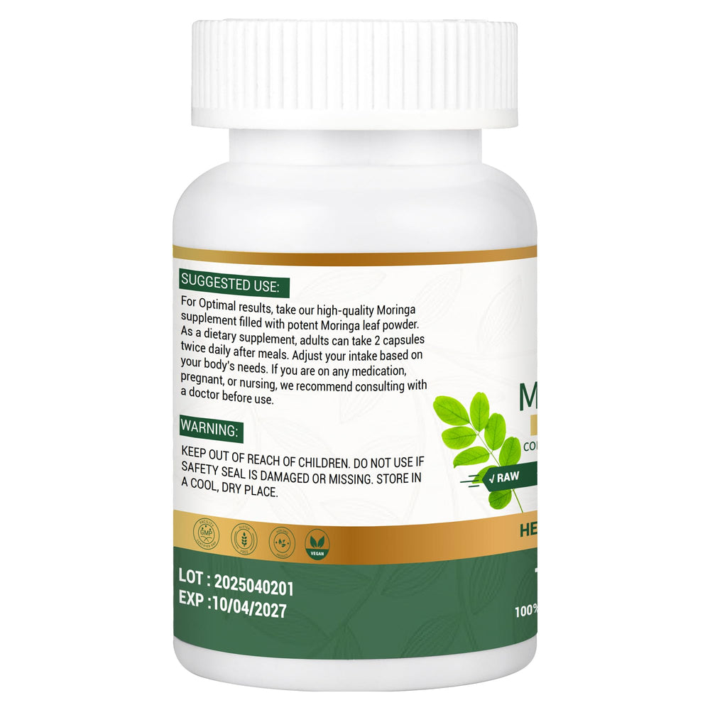 Vegan, plant-based moringa capsules on white background