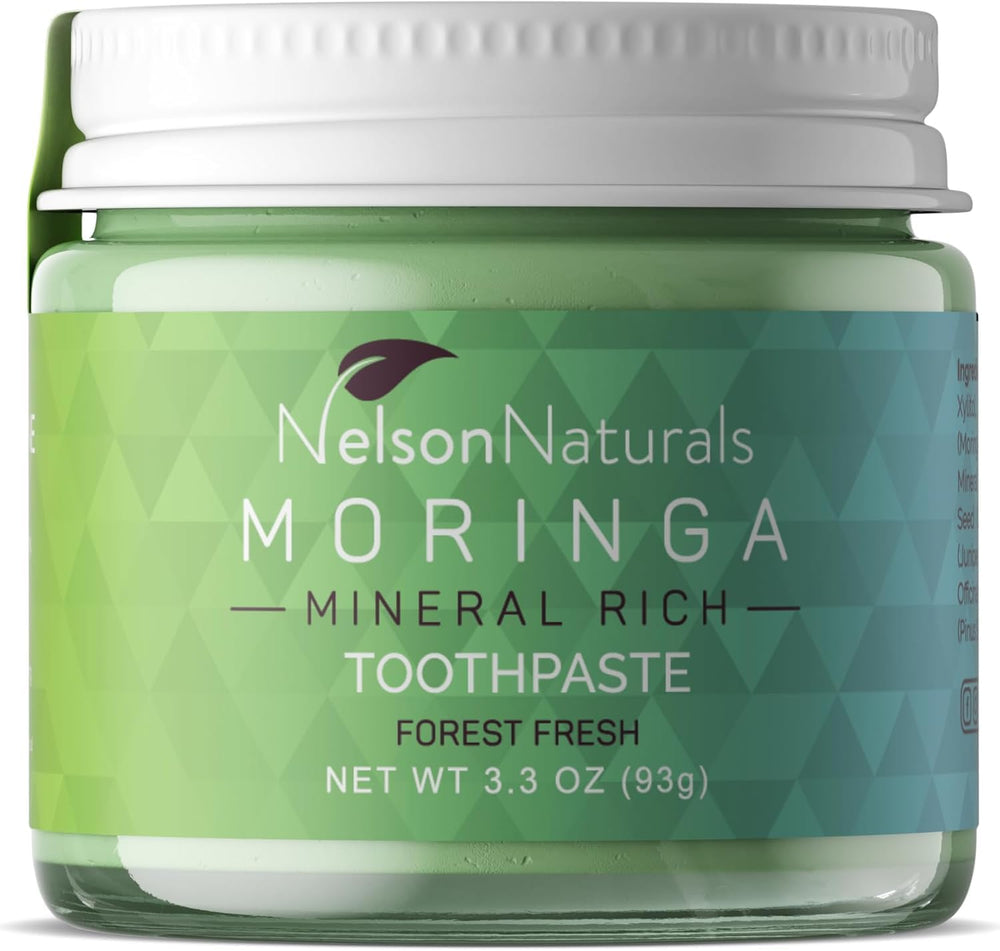 Front view of Moringa Mineral Rich Fluoride Free Toothpaste in a glass jar