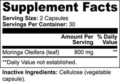 Close-up of Moringa leaves and capsules showing nutrient-rich powder