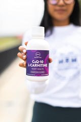 MRM CoQ-10 L-Carnitine Liquid pour showing smooth texture and flavor-ready supplement.