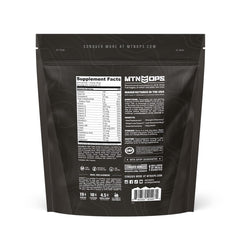 MTN OPS Ammo night-use bottle in dim lighting suggests pre-bed protein support.