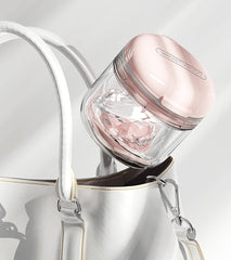 Inside view of denture bath case showing mirror and drain tray