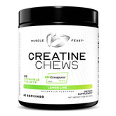 Bottle of Muscle Feast vegan creatine monohydrate lemon lime candy 120 tabs