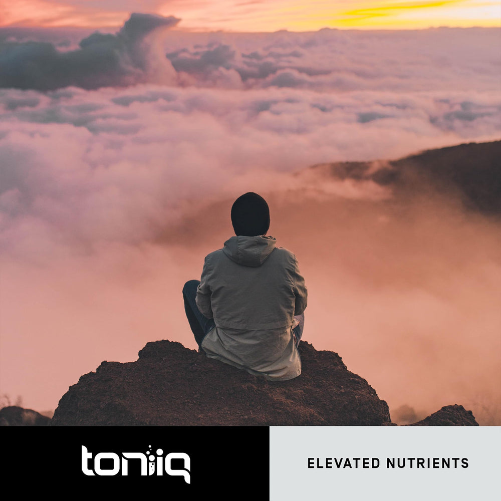 Mushroom Gummies served on a spoon with fresh fruit background