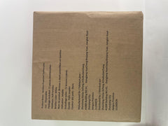 Eco-friendly packaging: toothbrush packed in a paper bag