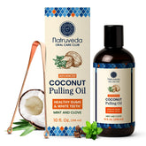 Close-up of Natruveda coconut oil pulling mouthwash bottle with mint