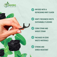 Close-up of bamboo charcoal-flavored floss in a floss pick