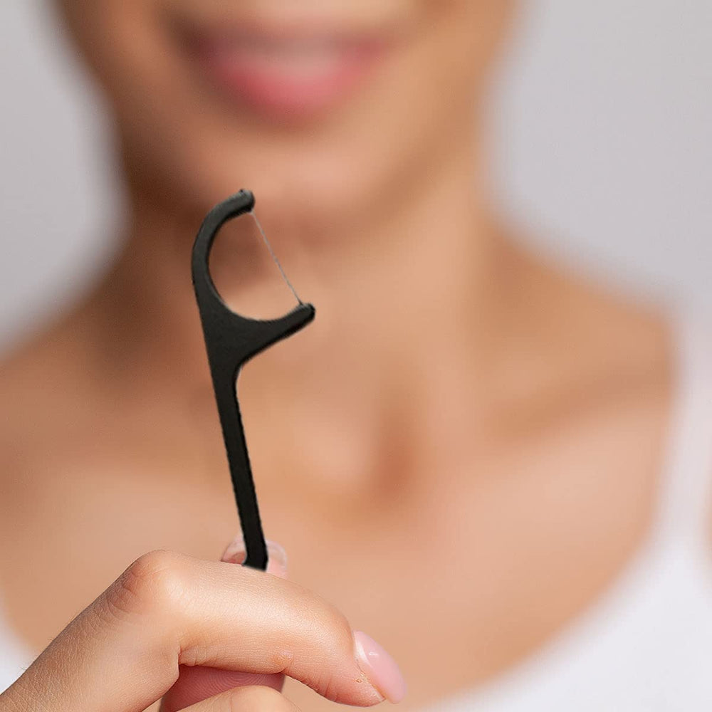 Packaging design showing zero waste packaging for floss picks