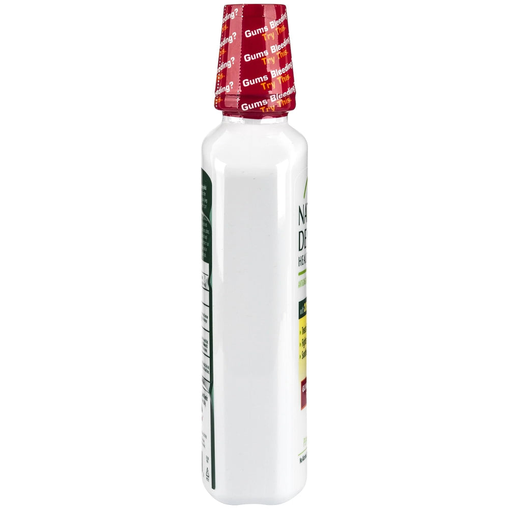 Mouth rinse bottle with mint leaves for Peppermint Twist flavor