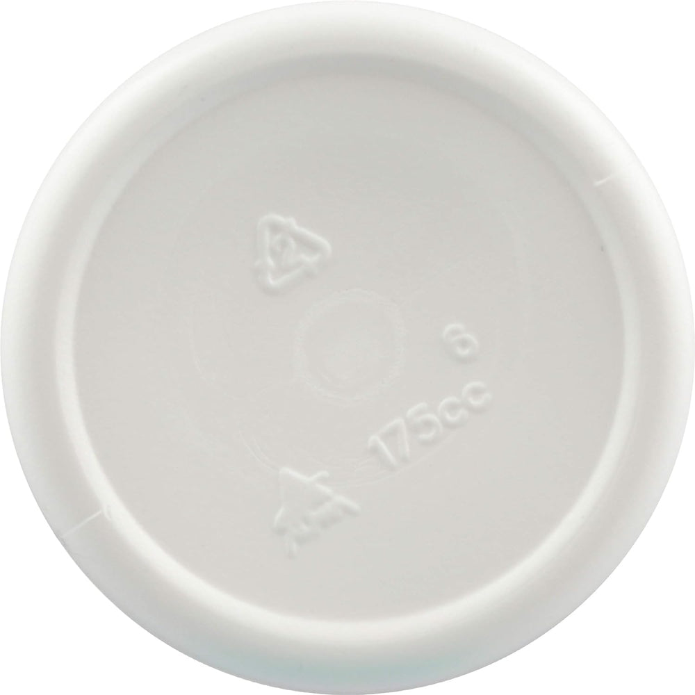 Capsules and bottle on white background