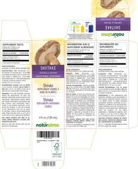 Shiitake tincture bottle dropper releasing liquid