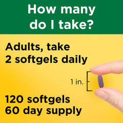 Glass of water beside Nature Made bottle, ready to take.