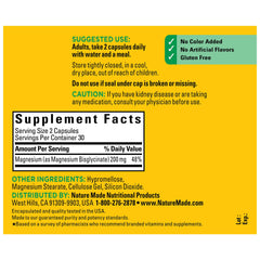 Nature Made Magnesium Glycinate capsules in a daily-use scene, ready to take two daily.