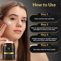 Hands applying anti-aging cream to reduce fine lines and wrinkles