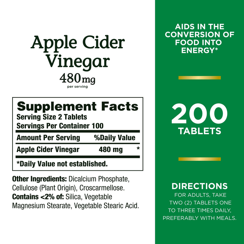 Close-up of two 480 mg Apple Cider Vinegar tablets