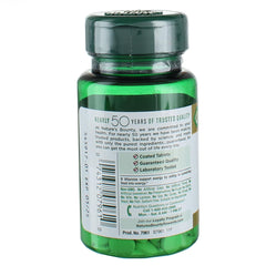 Close-up of Nature's Bounty Biotin 1000 mcg tablet