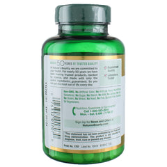Nature's Bounty Vitamin C 1000mg caplets on counter, ideal for daily routine.