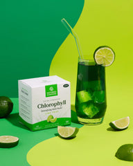 Chlorophyll stick pack being stirred into a glass of water