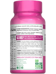 Bottle of Nature's Truth prenatal vitamins on a wooden surface