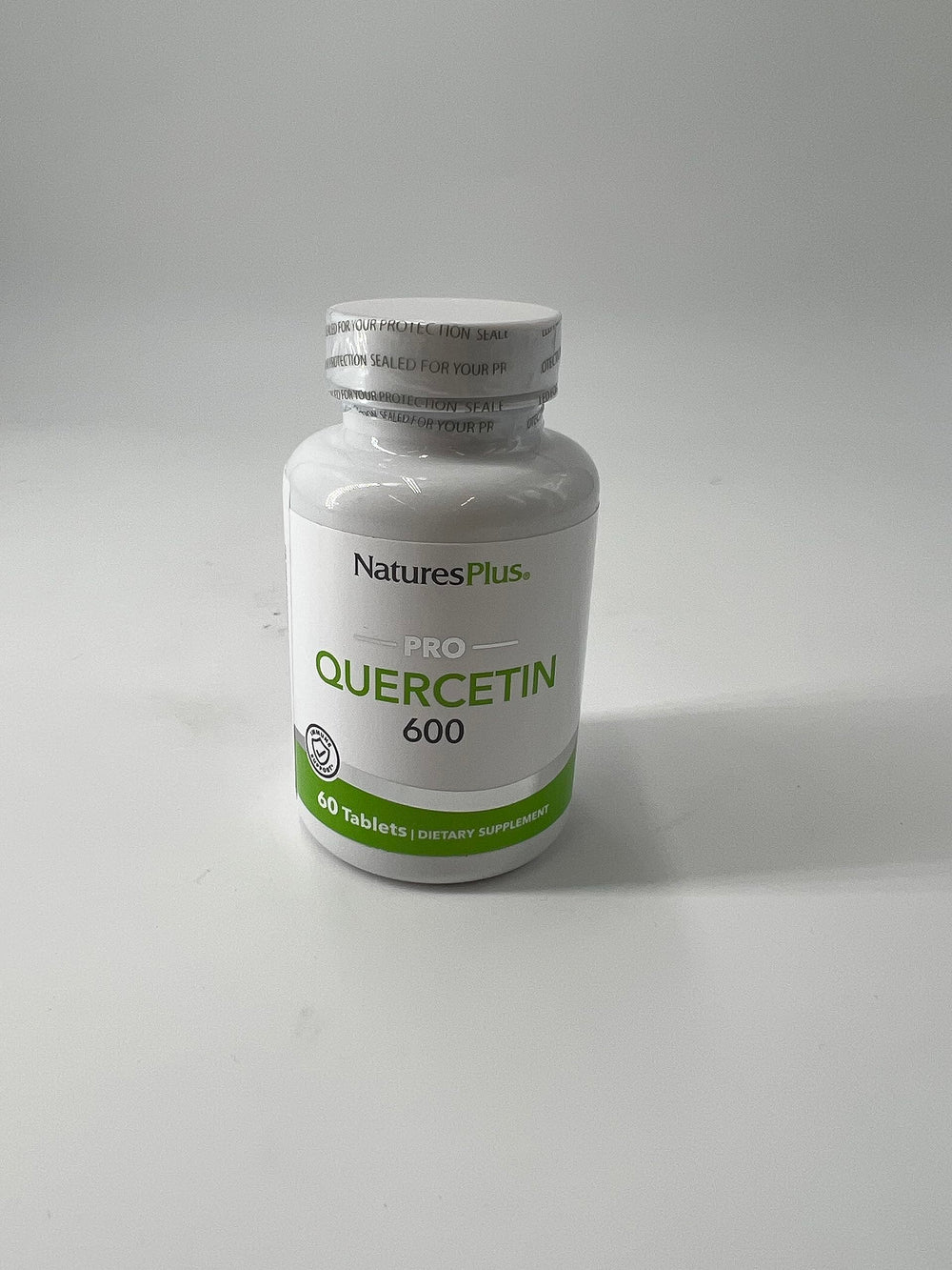 Close-up of 60 quercetin tablets