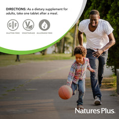 NaturesPlus bottle with apples in setting suggesting natural source