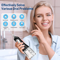 Front view of NBGRLVS water dental flosser with nozzle tips attached