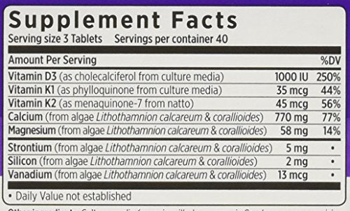 Calcium tablets shown next to the bottle