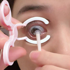 Suction cup and plunger for safe lens removal
