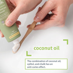 Front packaging of Niyok toothpaste highlighting vegan and organic certifications
