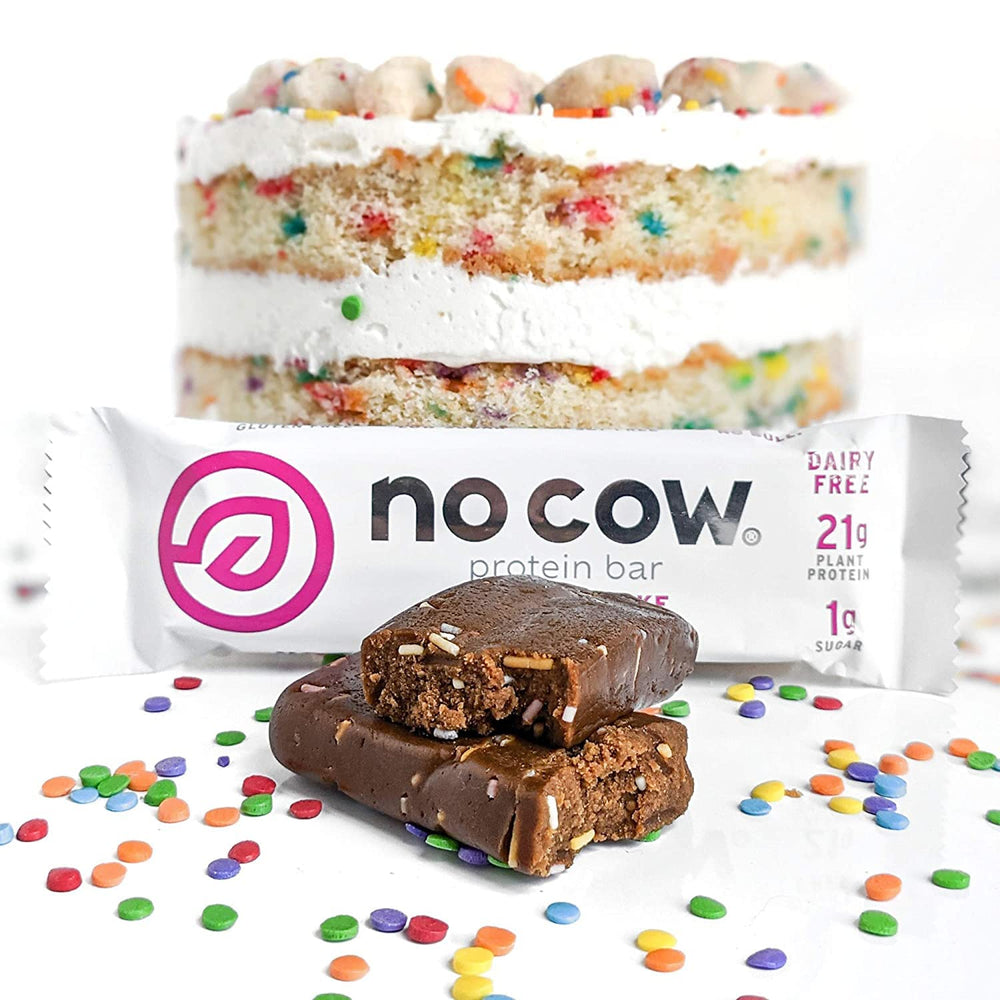 No Cow Birthday Cake bar sliced reveals dense protein bite.