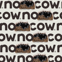 No Cow cookies-n-cream texture closeup emphasizes fiber-rich, low-sugar snack.