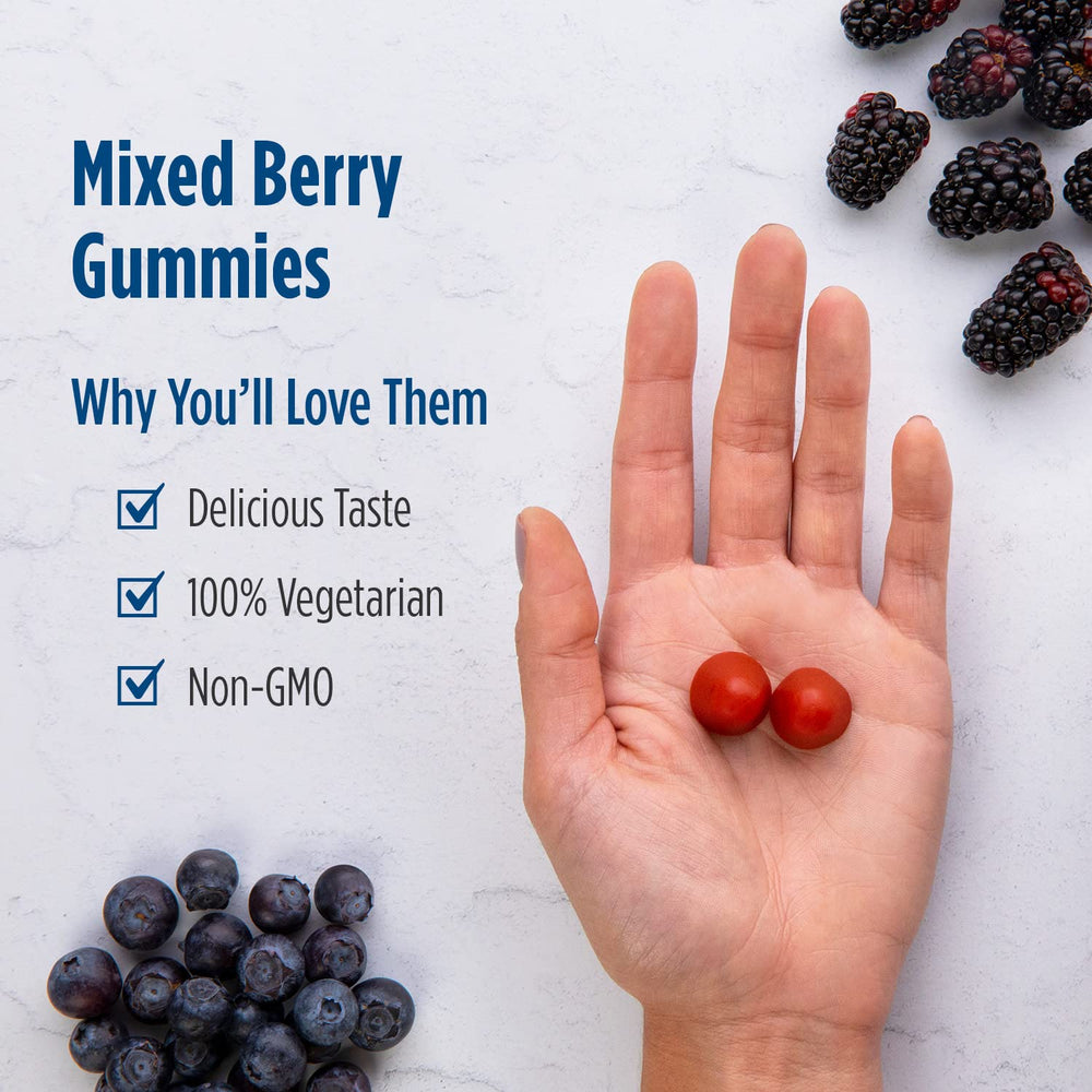 Gummies placed beside fresh berries to highlight flavor