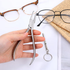 Nose pad plier included in eyeglass repair kit