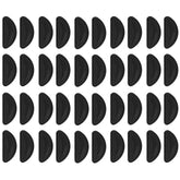 Close-up of black adhesive silicone eyeglass nose pad