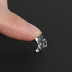 Transparent anti-slip nose pads on rimless eyewear