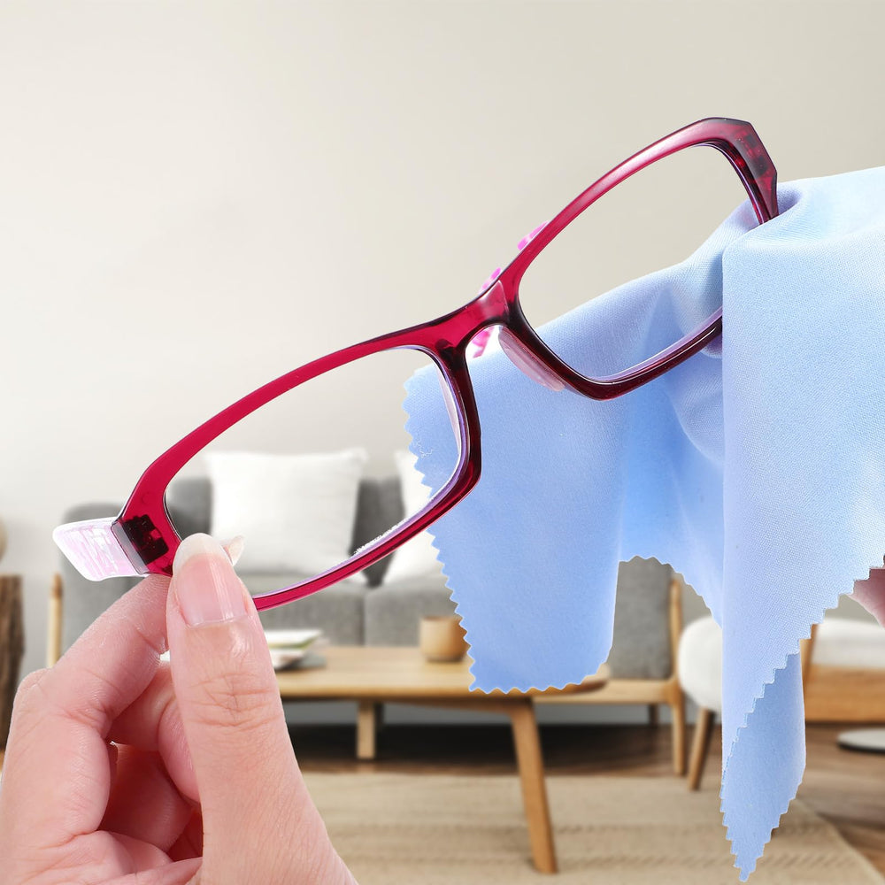 Open packaging showing 10 nose pad pairs and 2 cleaning cloths