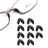 Transparent pea-shaped adhesive eyeglasses nose pads packaging front view