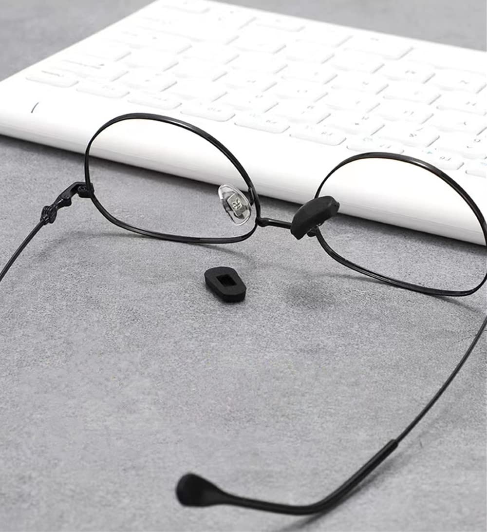 Slip-on silicone nose pads attached to eyeglasses