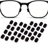 Black foam eyeglass nose pads (16 pairs) with adhesive