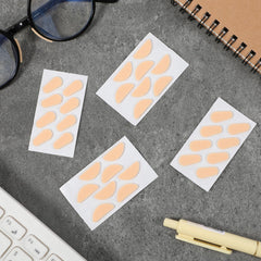 Foam nose pads on a plastic eyeglass frame