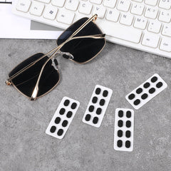 Easy-apply self-adhesive nose pads on glasses frame