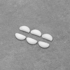 Three pairs of white nose pads for eyewear