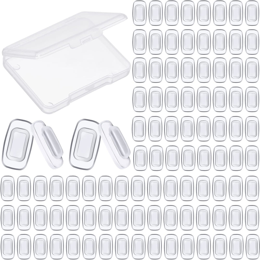 50 pairs of clear silicone push-in eyeglass nose pads with cleaning cloth