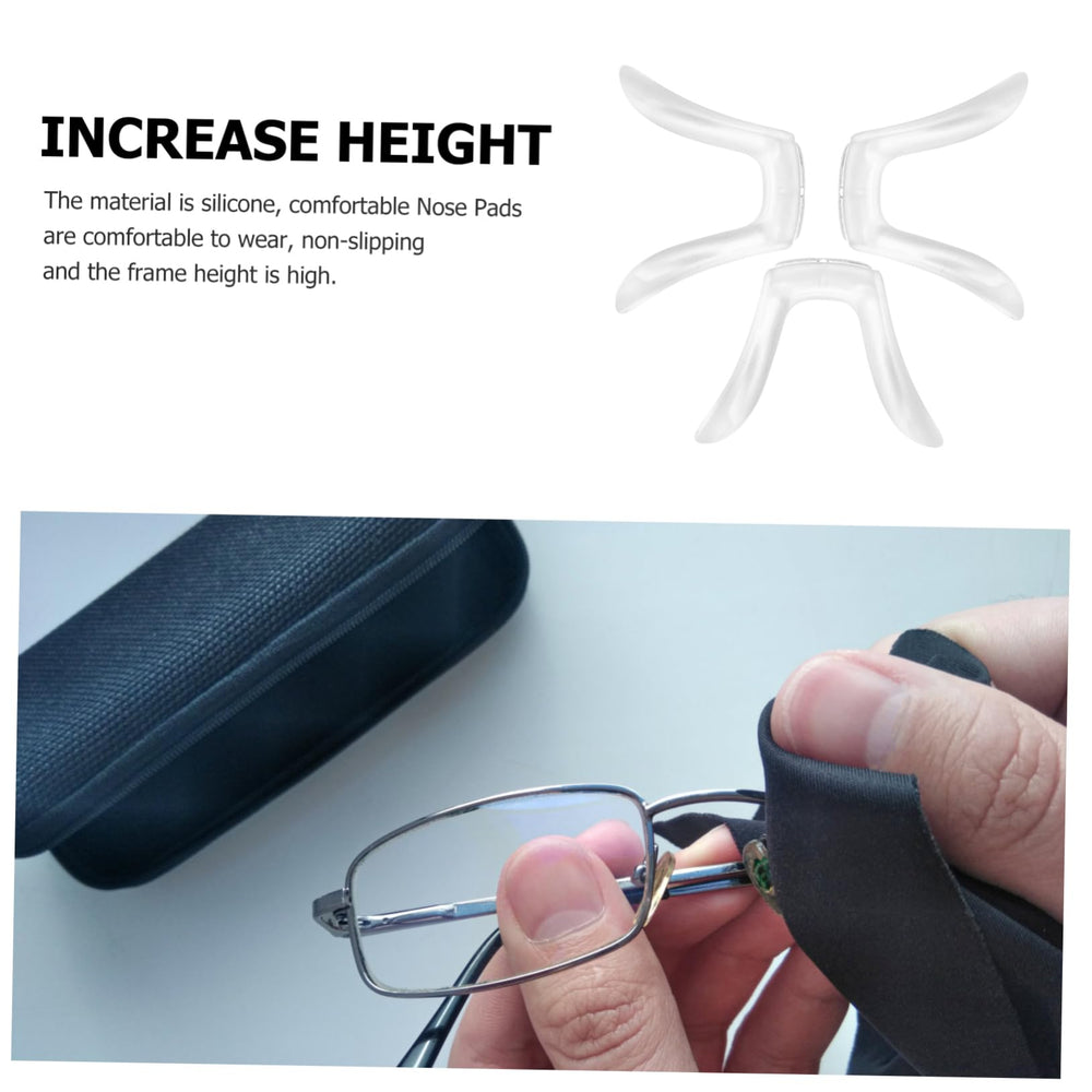 Three replacement nose pads for glasses on white background
