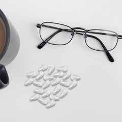 Simple tool-free installation of nose pads on glasses