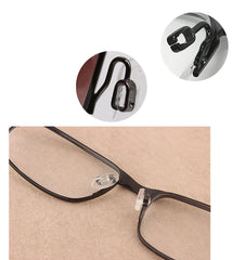 Push-in nose pads being installed on eyeglasses frame