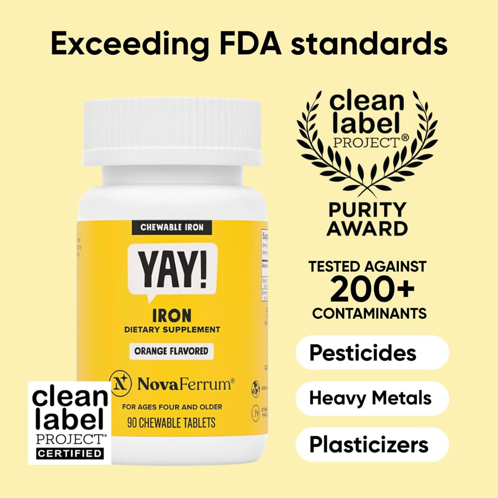 Close-up of NovaFerrum Yay orange chewable iron tablet showing texture