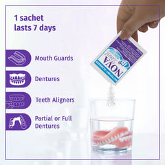Prepared cleaning solution in ¾ cup warm water with Novadent sachet